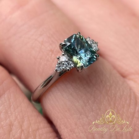 Yellow-blue-sapphire-diamond-ring-bentley-de-lisle-hand-paddington