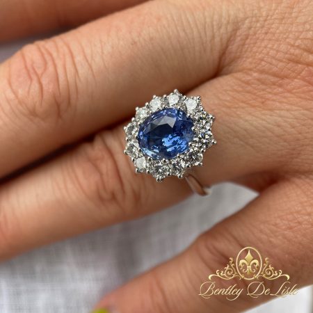 Cornflower-blue-sapphire-diamond-ring-bentley-de-lsile-hand-2