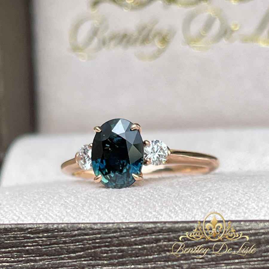 Teal-oval-sapphire-argyle-diamond-ring-11448-box-outdoor-bentley-de-lisle